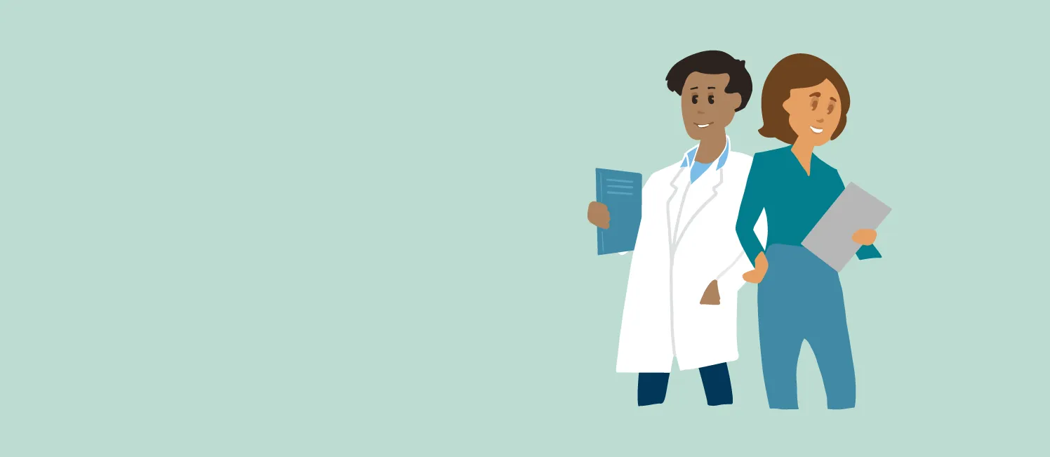 Ein Arzt und und eine Pfegefachkraft die nebeneinander stehen